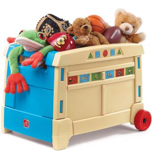 Image of a toy box, overflowing with teddy bears